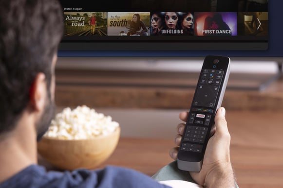 jpeg-optimizer_man-watching-show-his-tv (1)